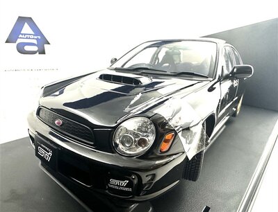 Autoart Modellauto Subaru New Age Impreza WRX STI 1:18